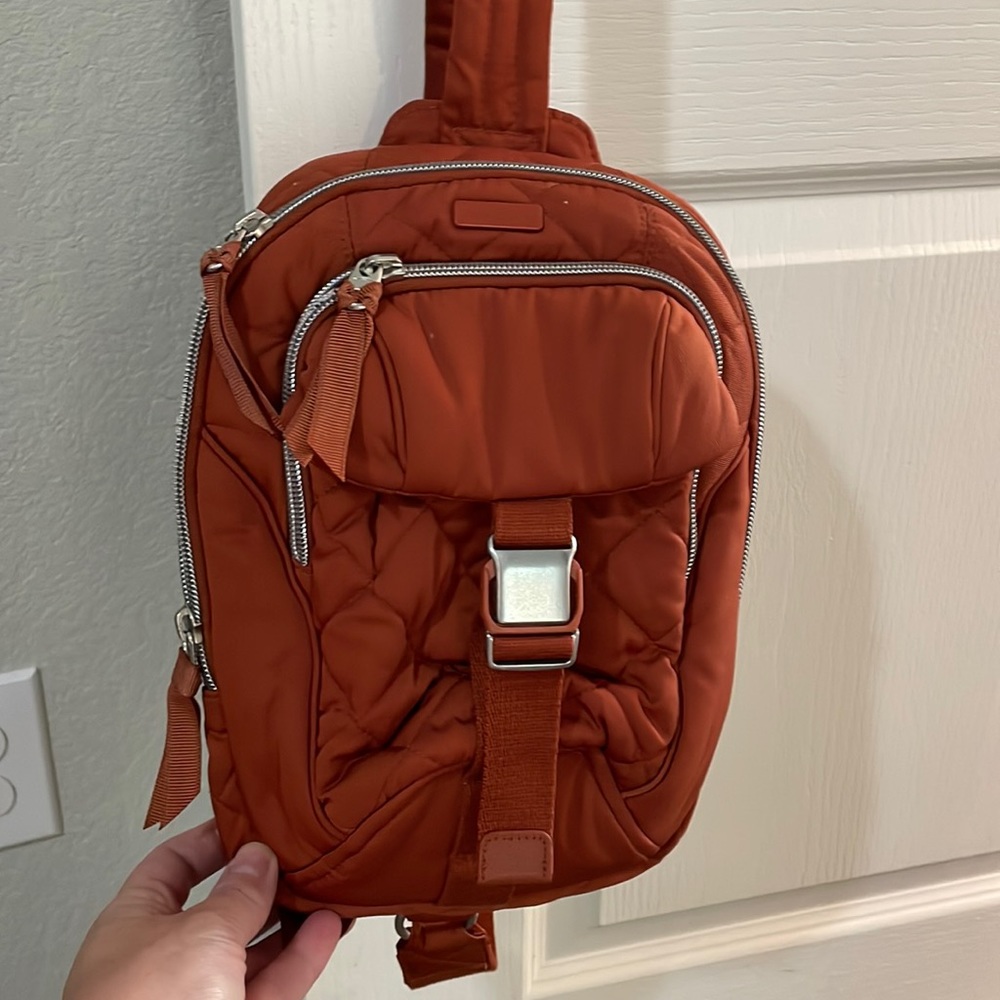 Vera Bradley sling backpack rust